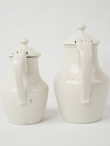 Delicate antique Limoges water pitchers