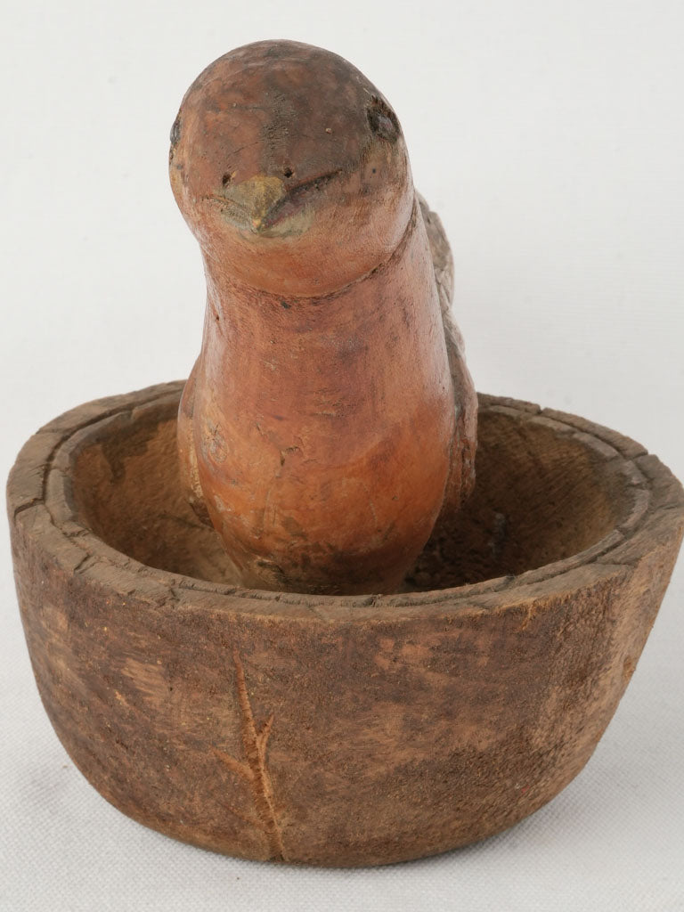 Warm weathered patina bird carving