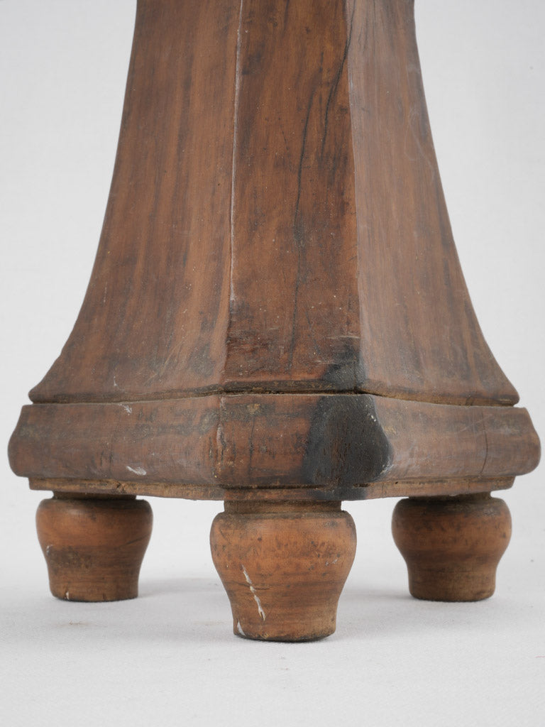 Aged patinated wood candlestick