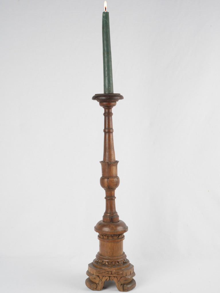Antique Italian carved walnut candlestick