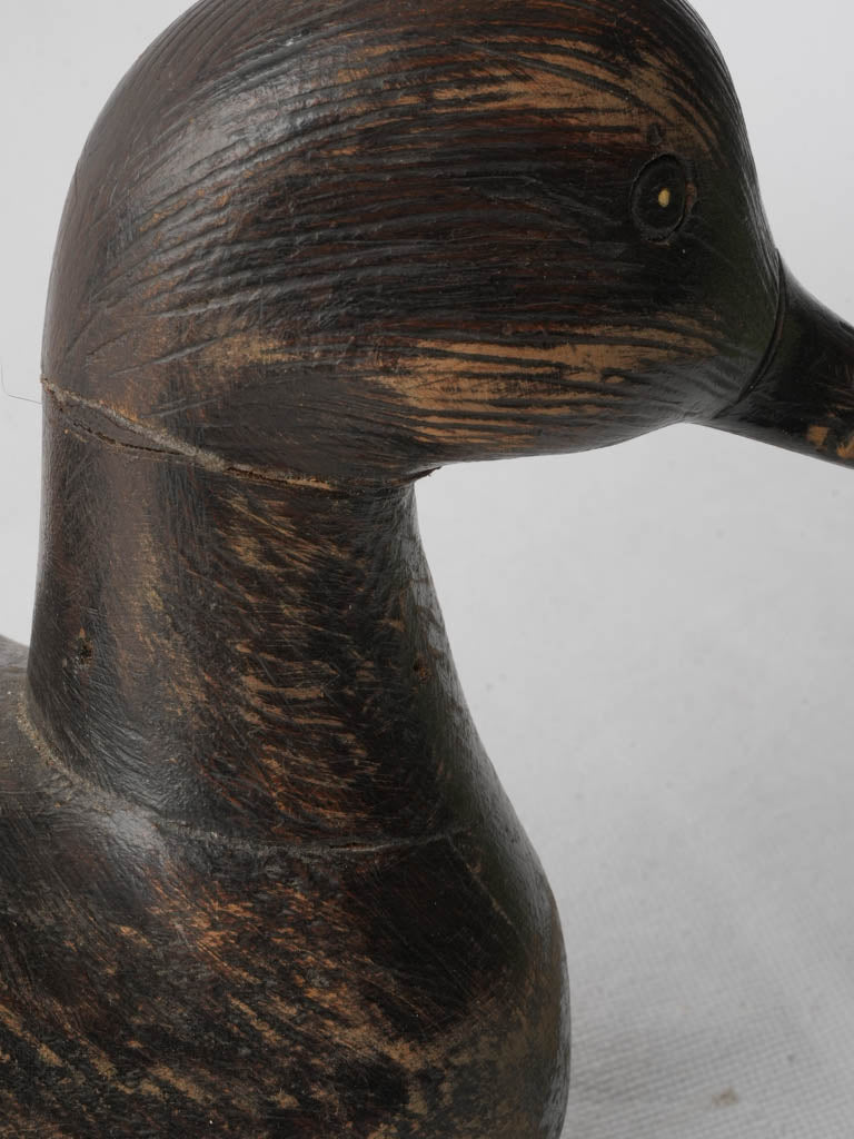 Muted patina French duck decoy