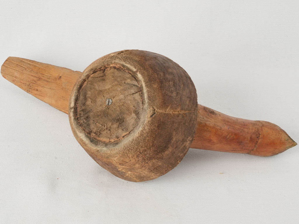 Intricately carved rustic bird artwork