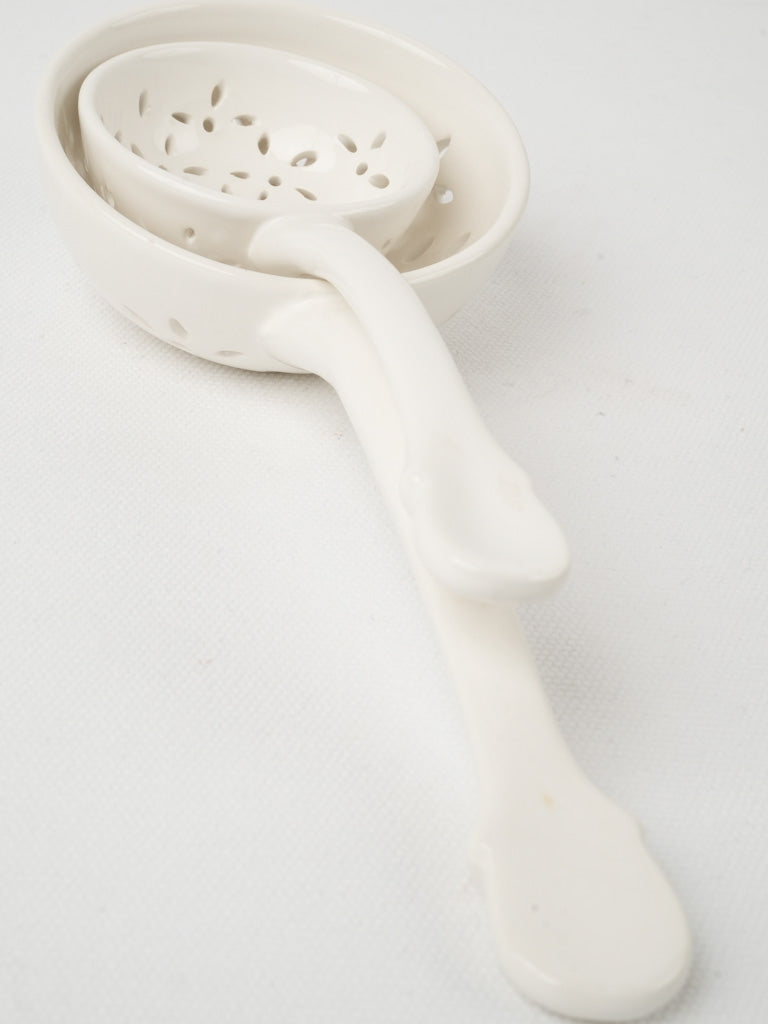 Elegant, traditional white slotted spoons
