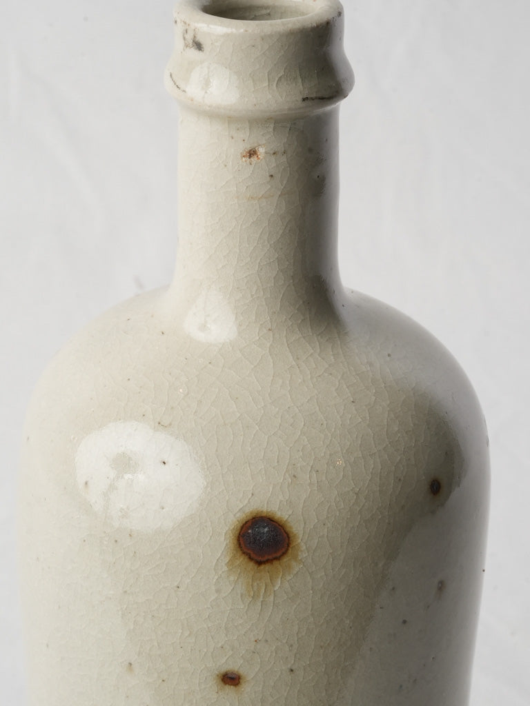 Distinctive soft-glaze stoneware flask  