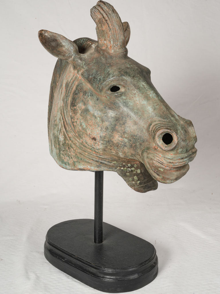 Stylized antique bronze horse head