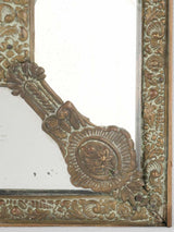 Historic seashell-motif brass mirror artwork
