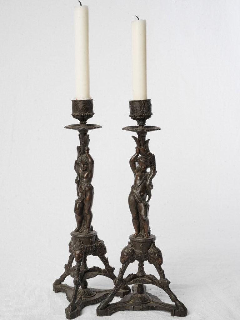 Ornate foliage motif candlestick pair  