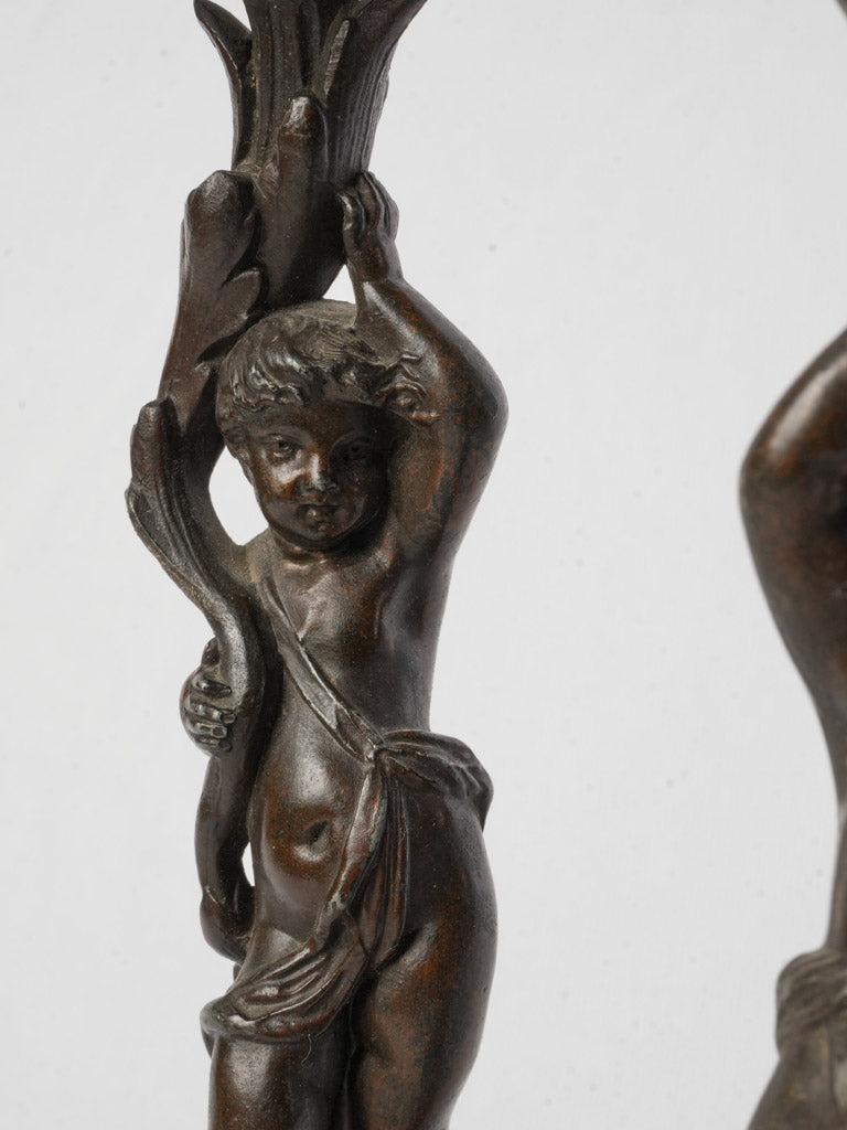 Balanced design antique candlestick pair  
