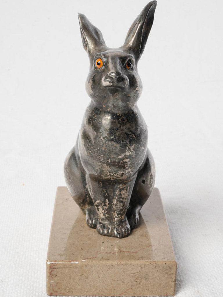 Petite metallic rabbit with amber eyes