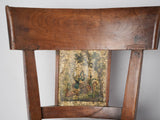 Aged walnut armchairs with artistry