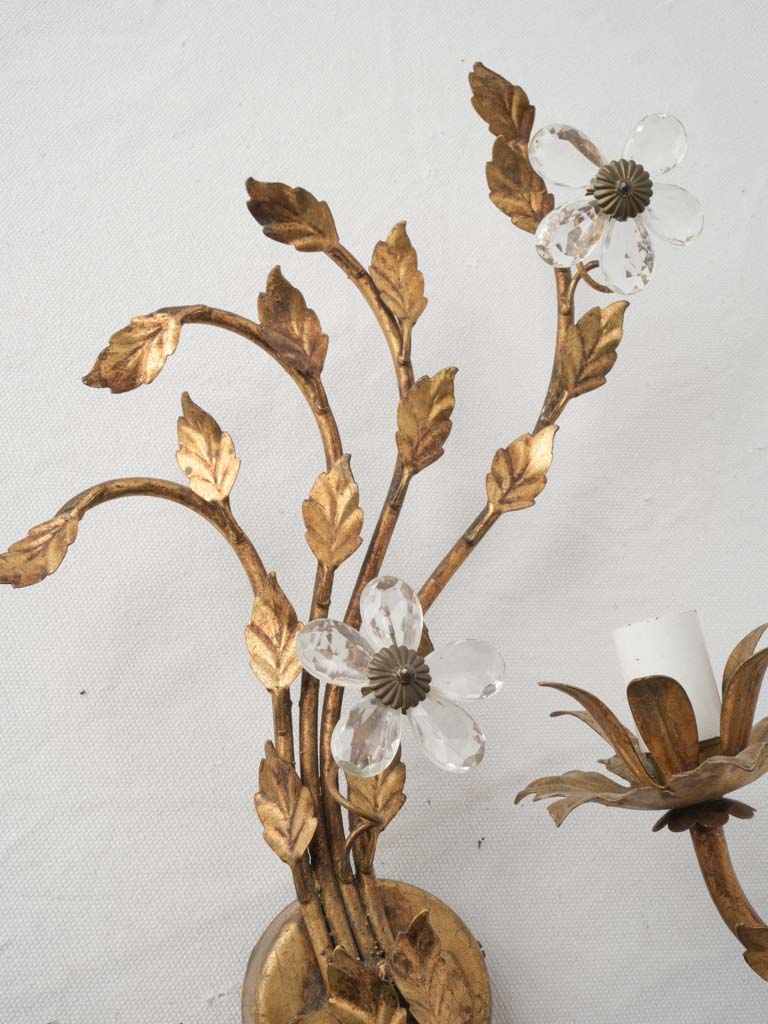 Floral-inspired gilt tole sconce  