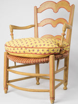 Antique Provençal yellow armchair with cushion