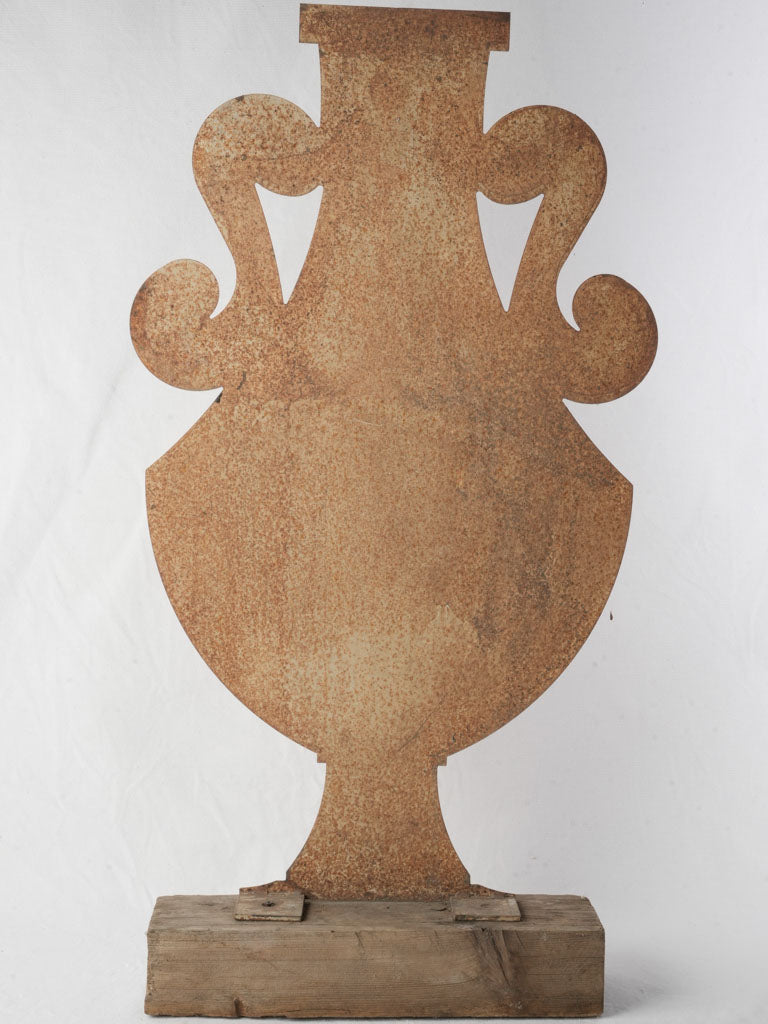 Rustic scroll-handled decor piece  