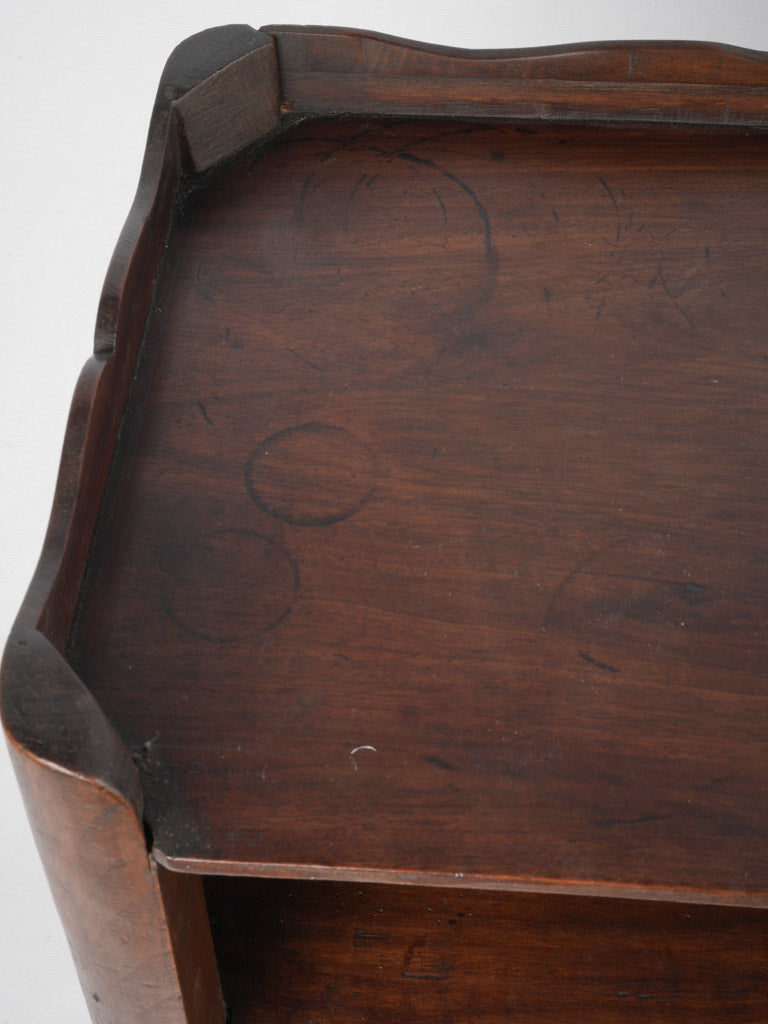 Stately walnut nightstand with heart cutouts