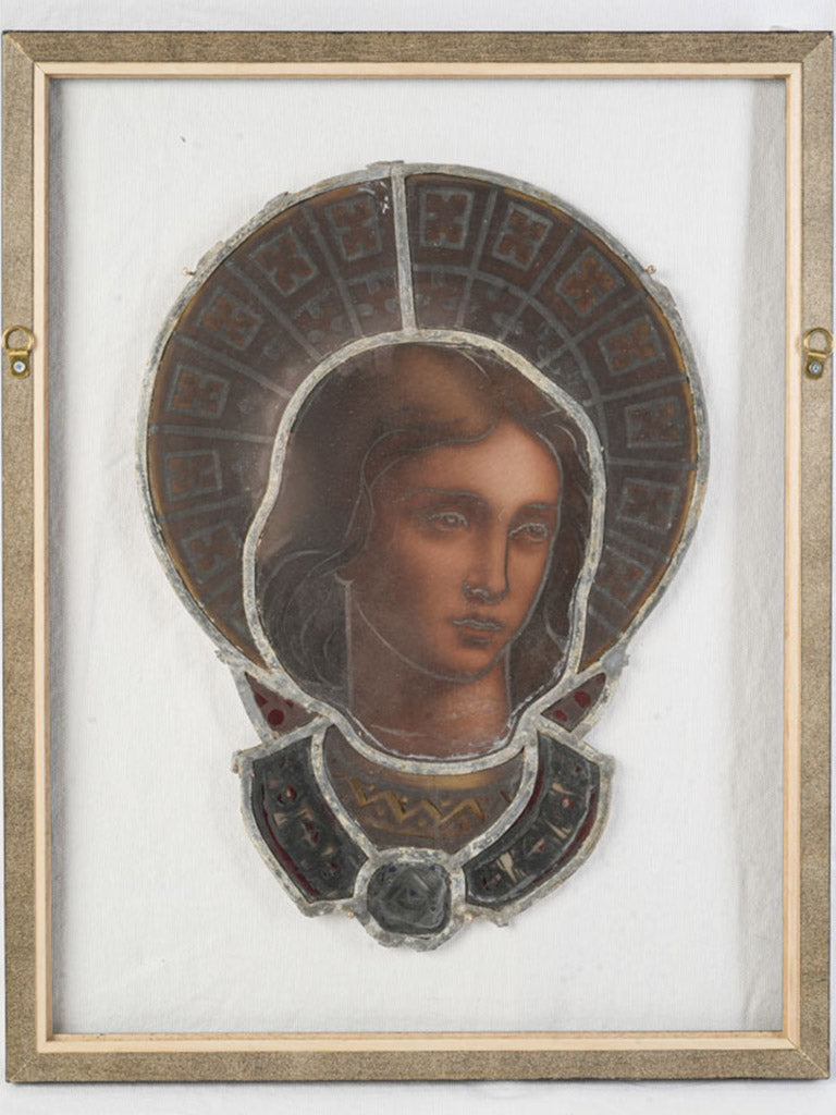 Aged ornate stained glass panel