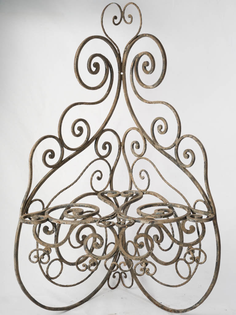 Patinated metal teardrop shelves  