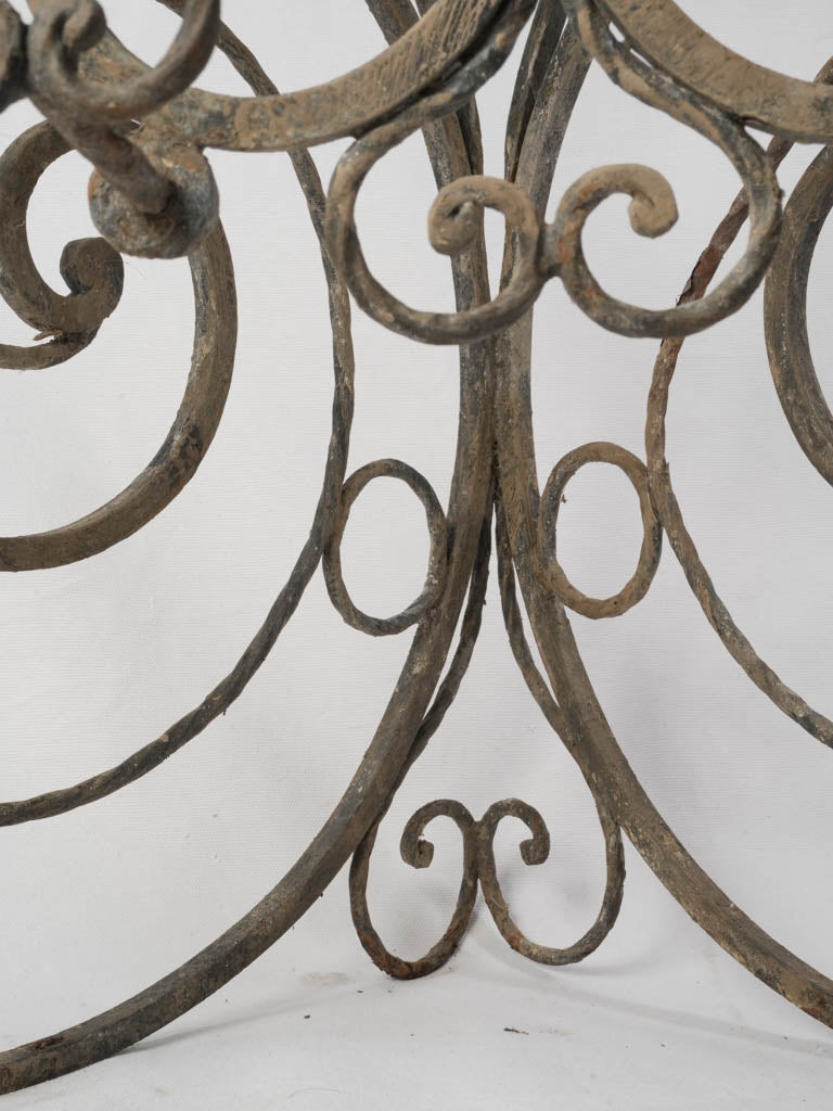 Graceful wrought iron hanging shelves  