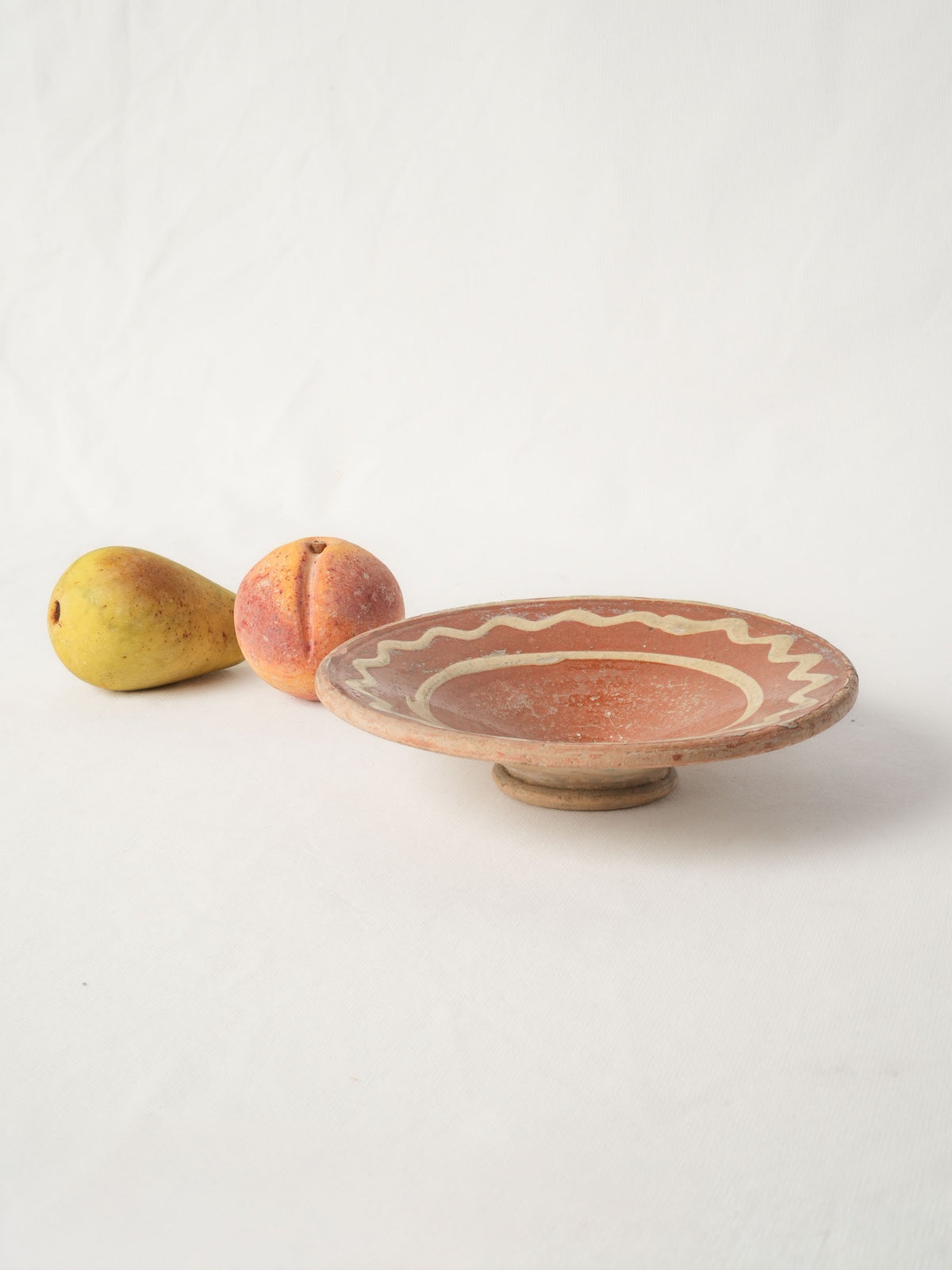 Small Antique Provençal Earthenware Tourne-Omelette with Orange and Cream Glaze - 8¼" diam.