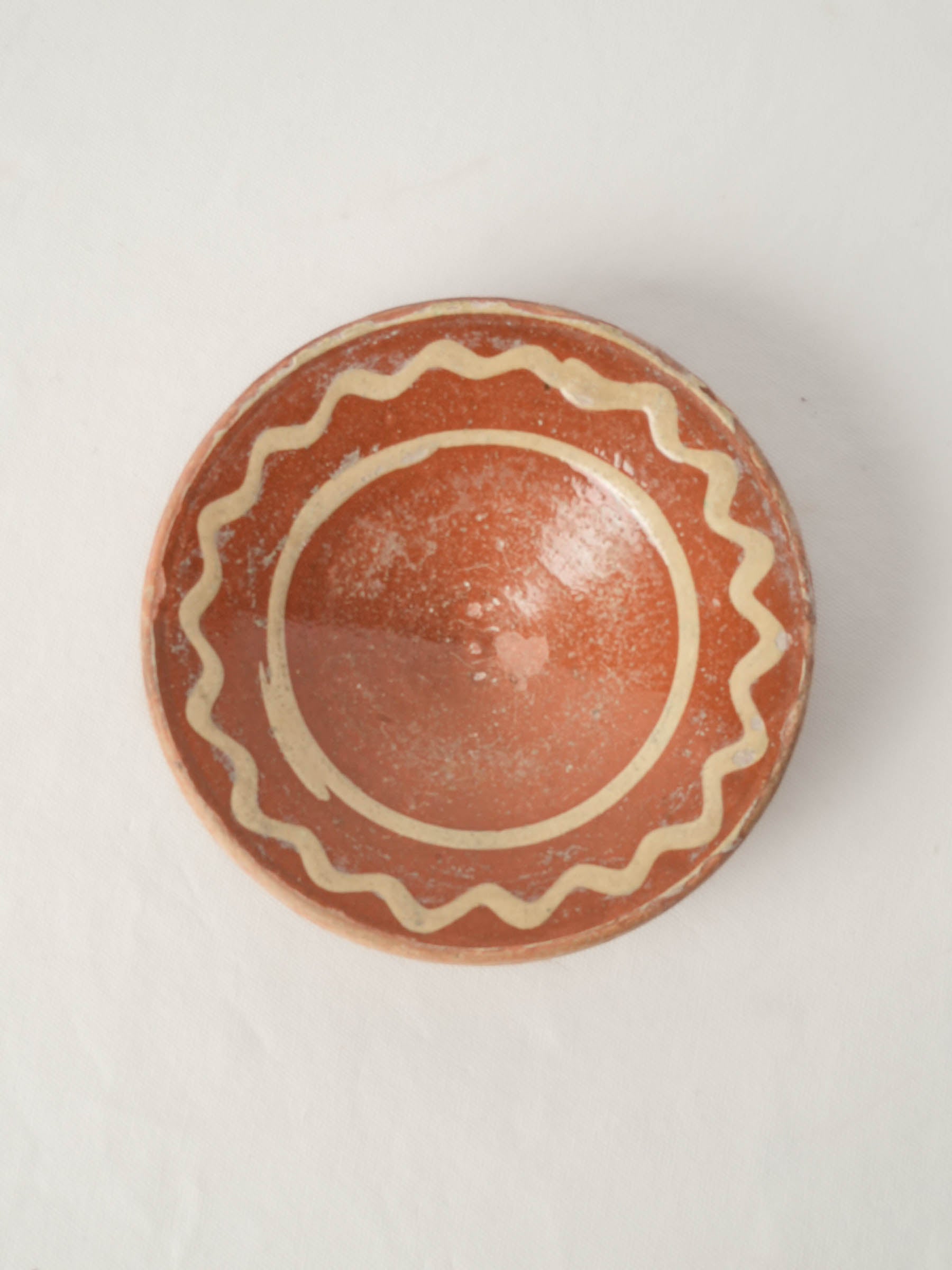Small Antique Provençal Earthenware Tourne-Omelette with Orange and Cream Glaze - 8¼" diam.