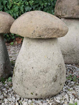 Antique stone mushroom sculptures