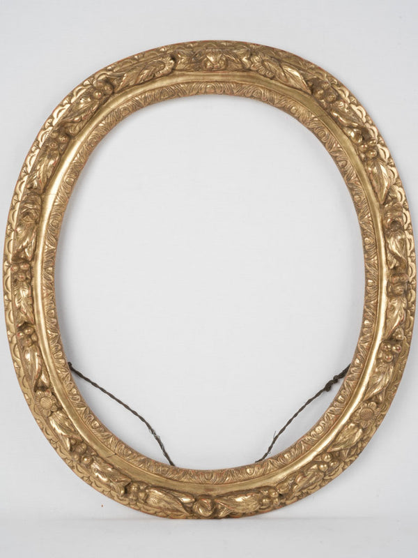 Antique gilded Regency oval frame
