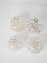 Collectible aged glass carafe quartet