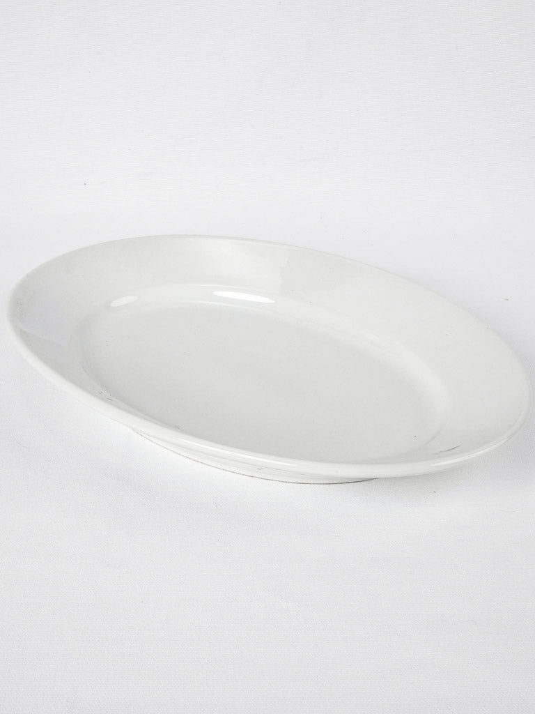 Large earthenware oval platter w/ white glaze 15¾" x 11"
