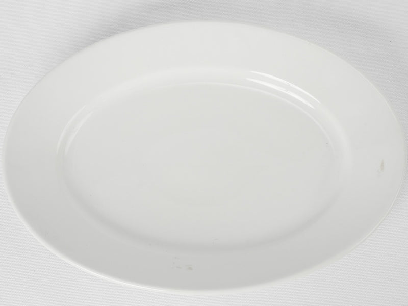 Large earthenware oval platter w/ white glaze 15¾" x 11"
