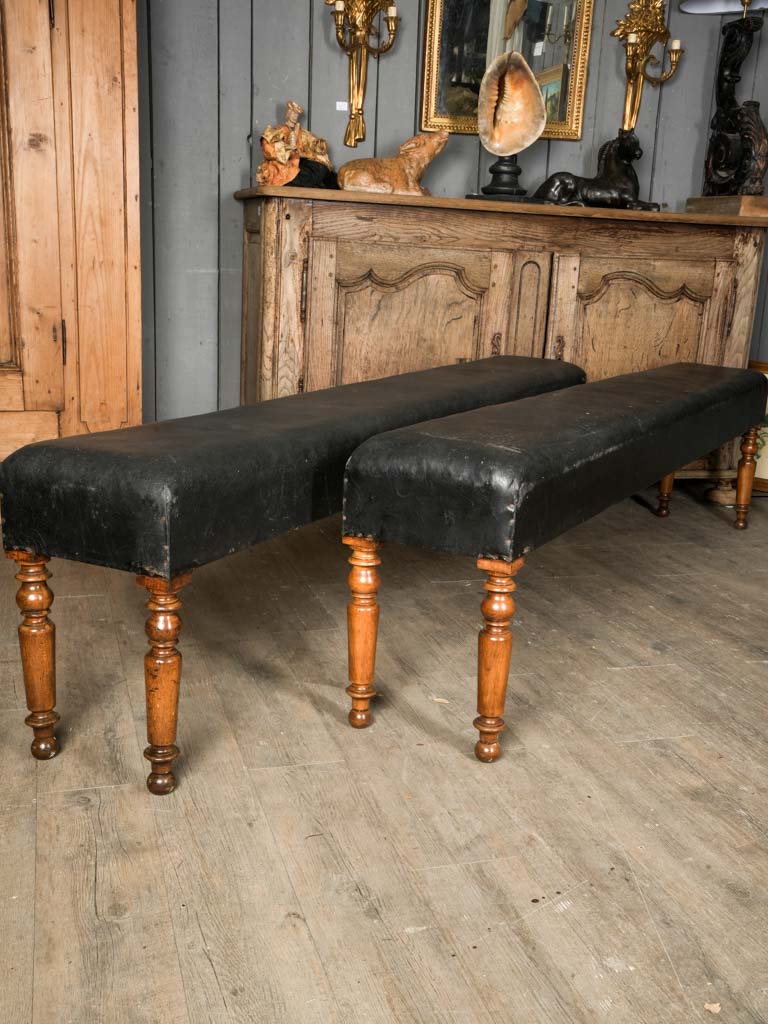 Relaxed, inviting black benches