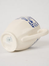 Old-world French porcelain cream jug