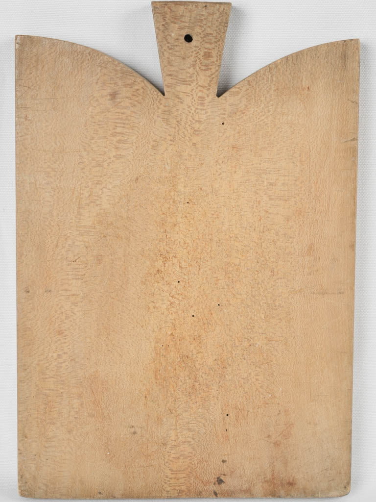 Aged rectangular wooden culinary tool