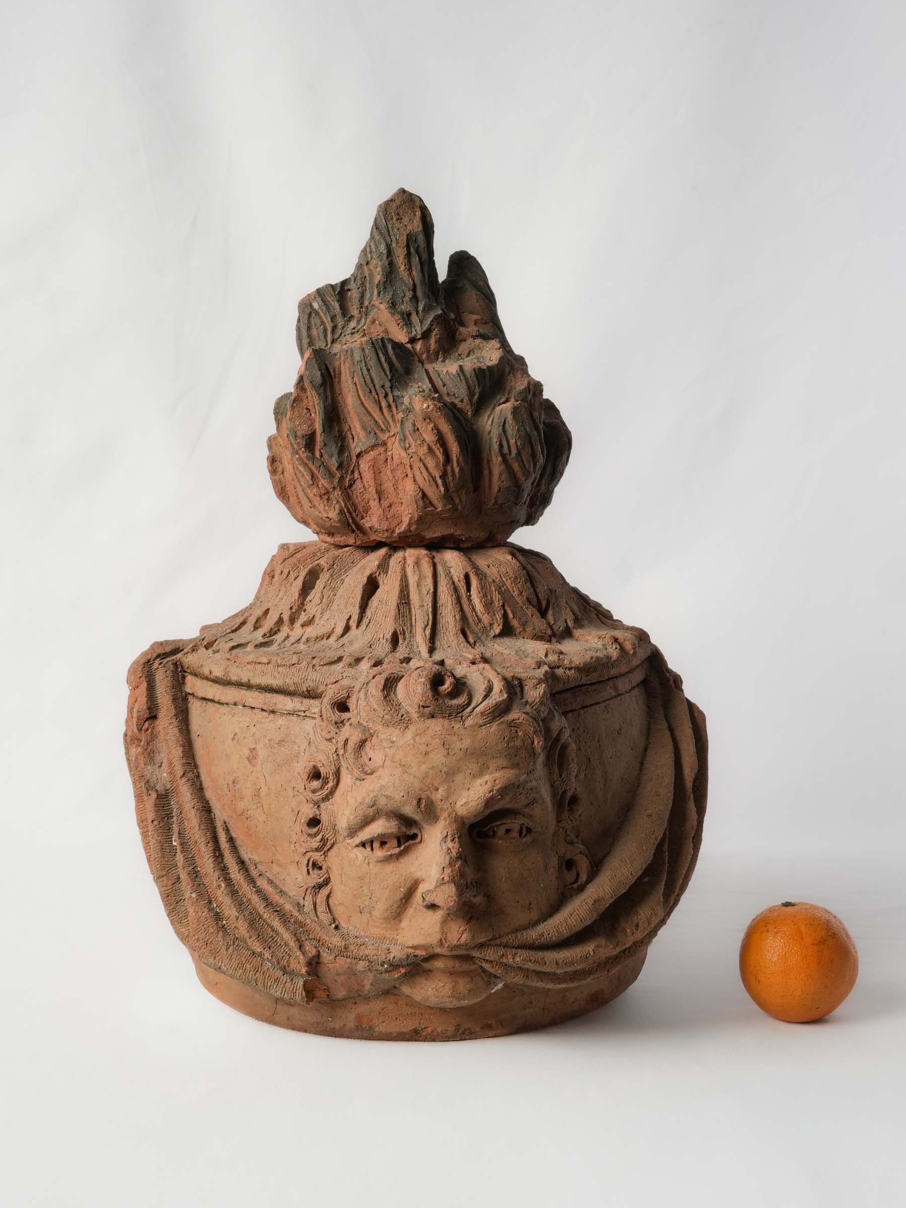 French Architectural Terracotta Flame Finial w/ Intriguing Mascarons, 18th Century - 18½"