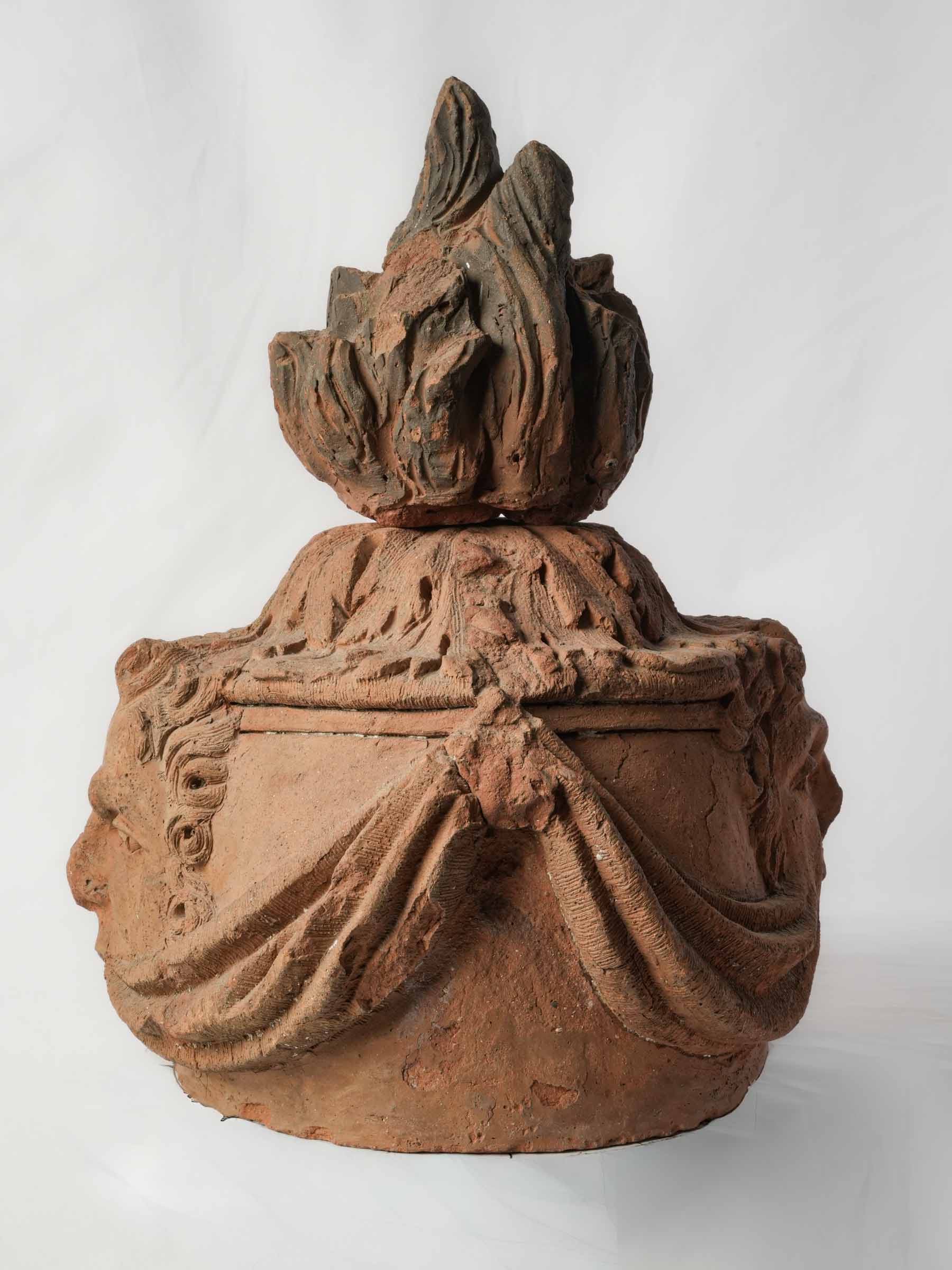 French Architectural Terracotta Flame Finial w/ Intriguing Mascarons, 18th Century - 18½"
