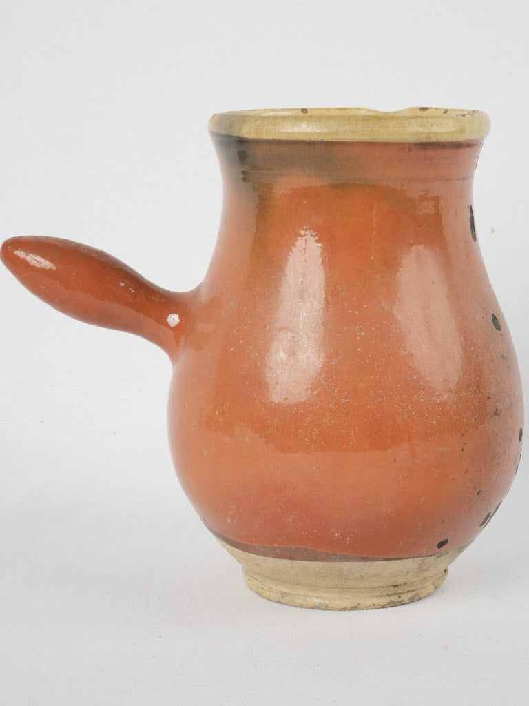 Delightful glazed terracotta milk pot