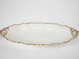Late 19th century Limoges porcelain dinner service w/ gold border
