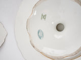 Late 19th century Limoges porcelain dinner service w/ gold border