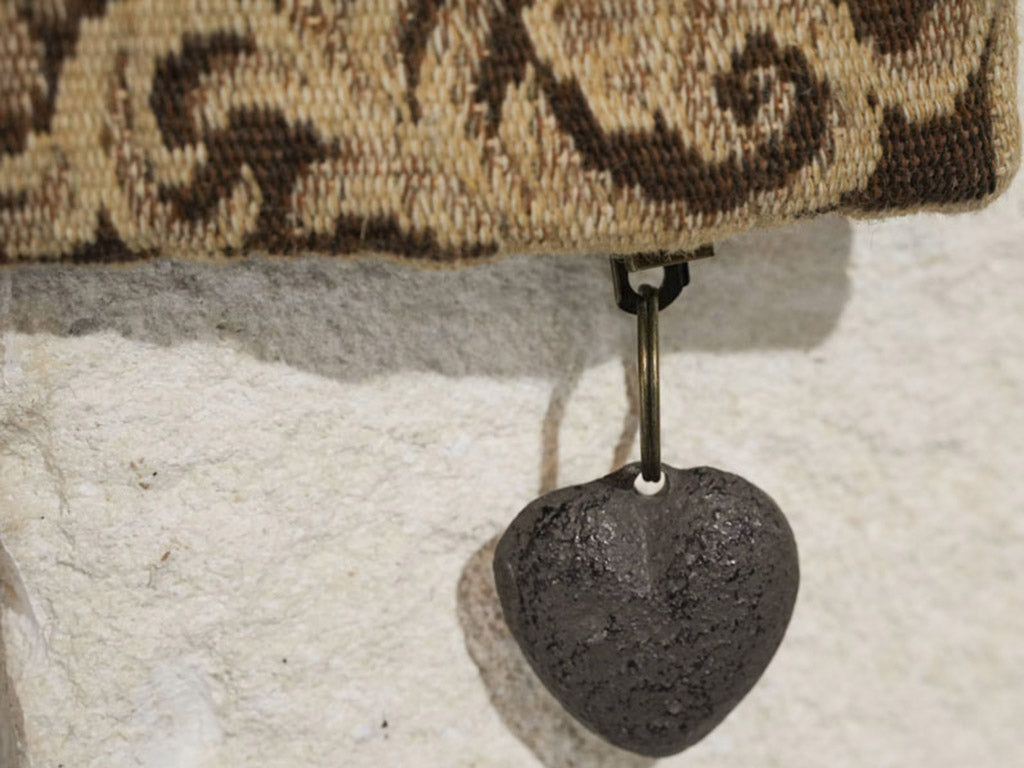 Ornate fruit-bordered wool masterpiece
