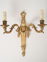 Detailed French gilt wall fixtures