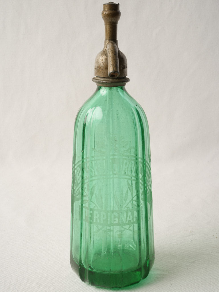 Striking emerald crystal soda siphon  