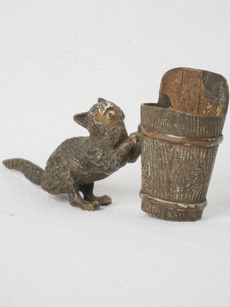 Whimsical antique bronze match holder
