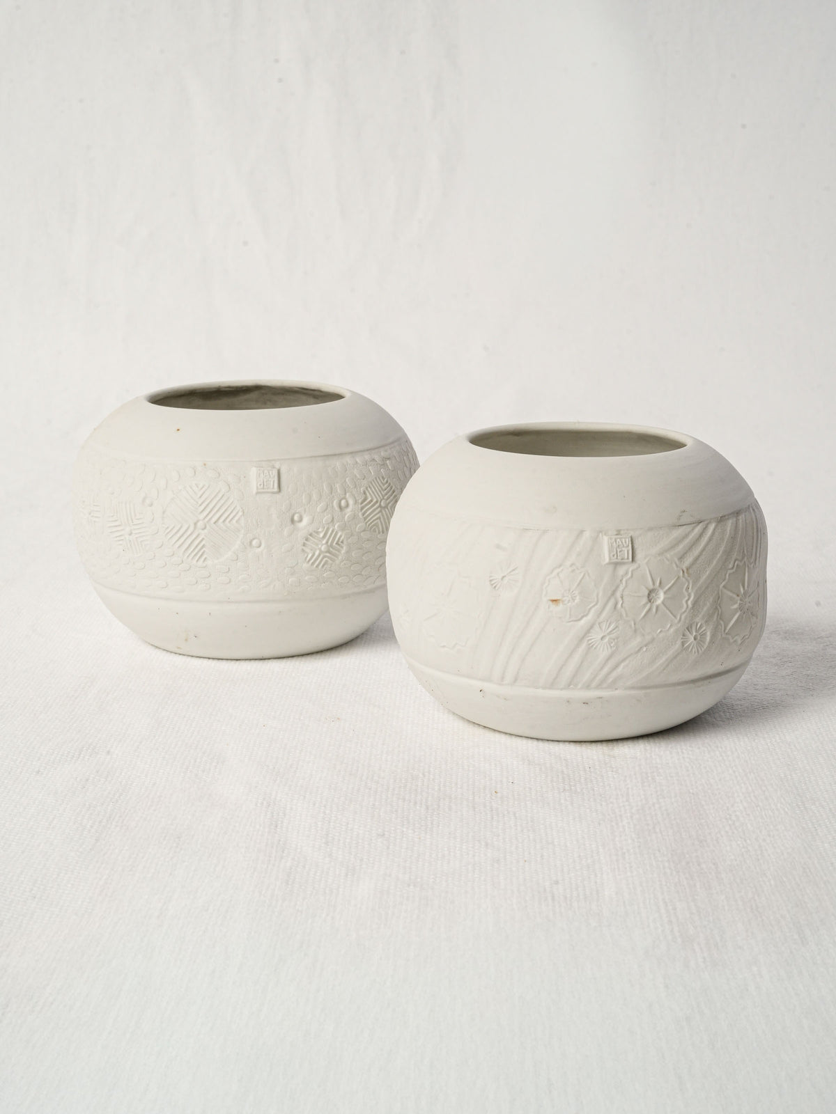 Pair of delicate porcelain candle holders by Atelier-A - 4¾"
