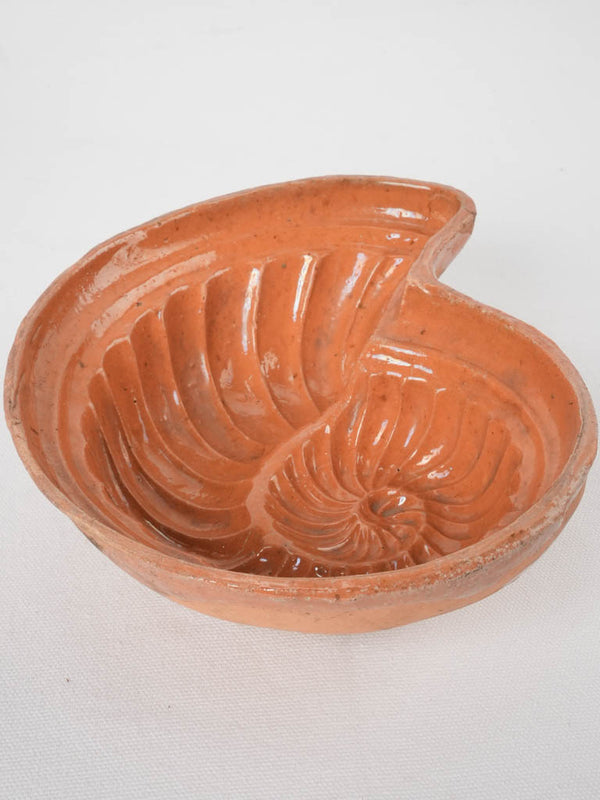 Antique terracotta snail cake mold