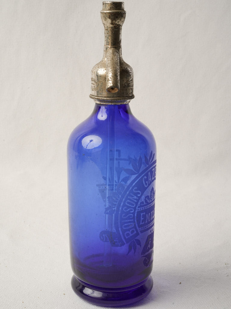 Richly colored glass soda siphon