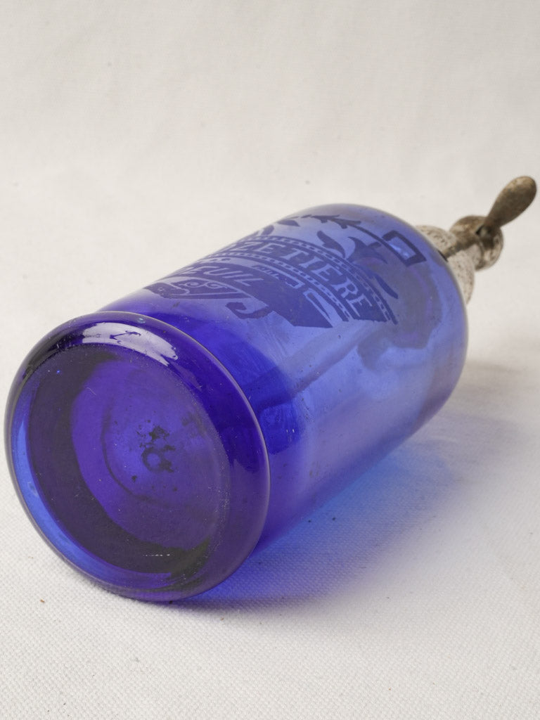 Sculptural cobalt-blue soda siphon
