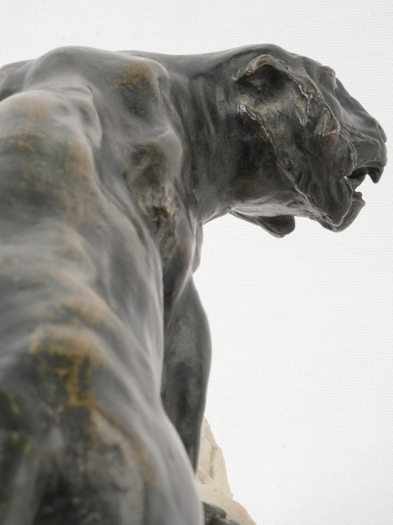 Muscular bronze tiger sculpture