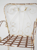 Elegant weathered iron armchairs set