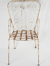 Vintage outdoor iron armchairs in white