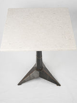 Aged square stone outdoor table