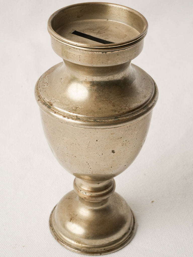 Vintage nickel silver coin bank  