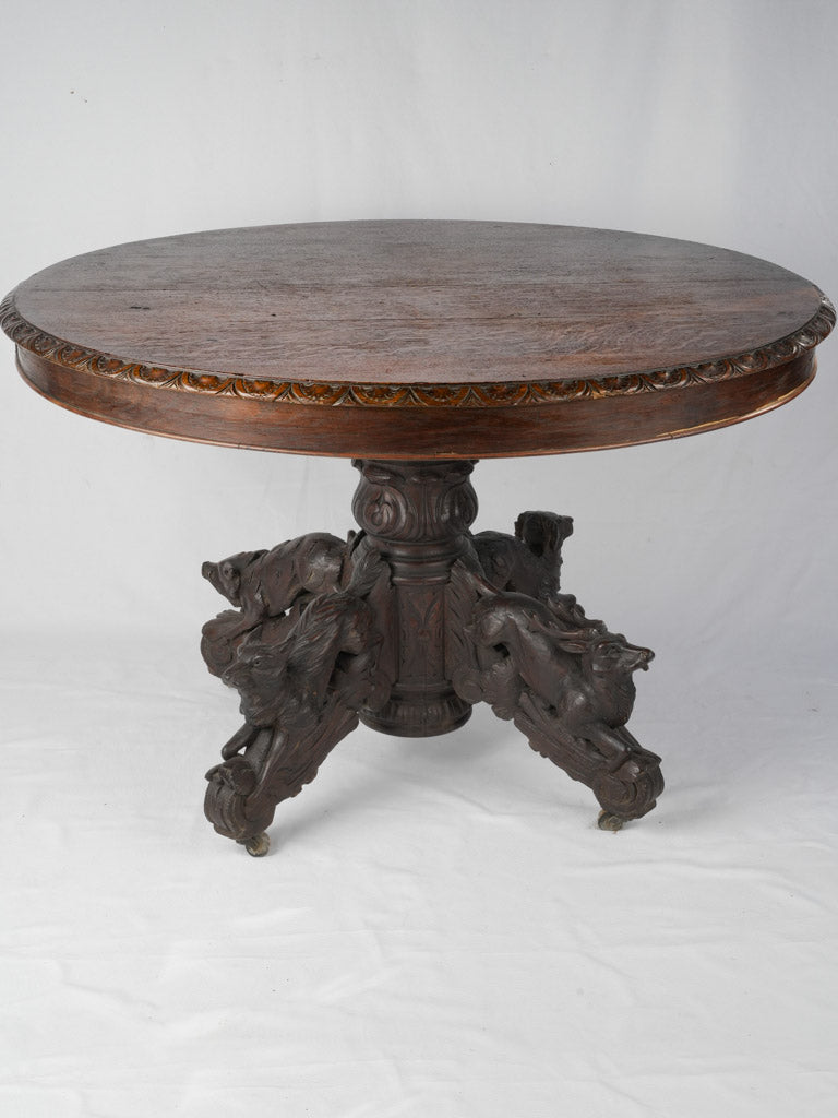 Sculpted animal-themed French oak table
